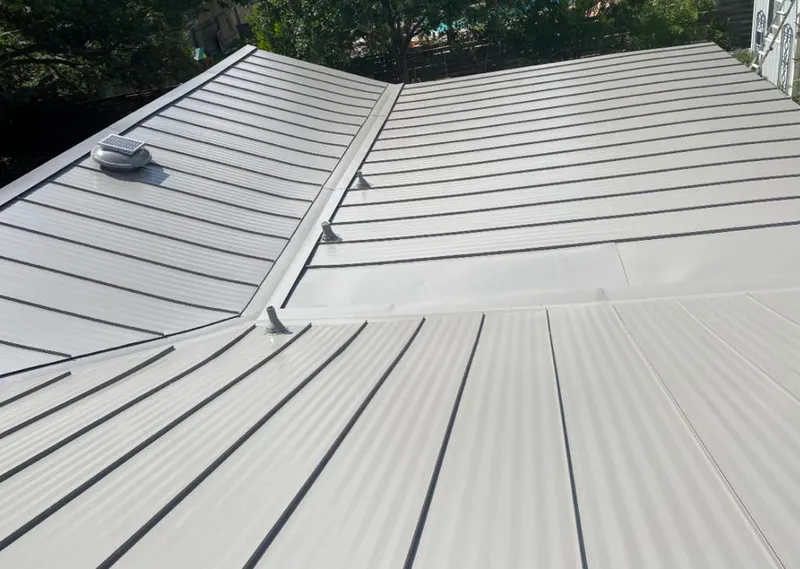 Solar attic fan installed on a metal roof for Roof Ventilation in Nevada